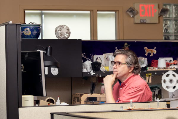 Erik Hluchan at desk at Structural Graphics