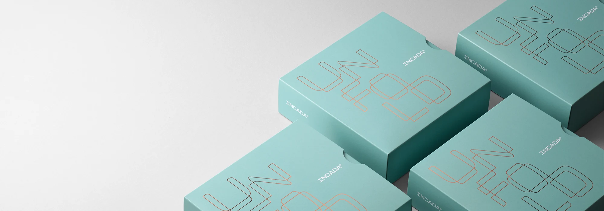 Blue paperboard boxes placed on light grey background