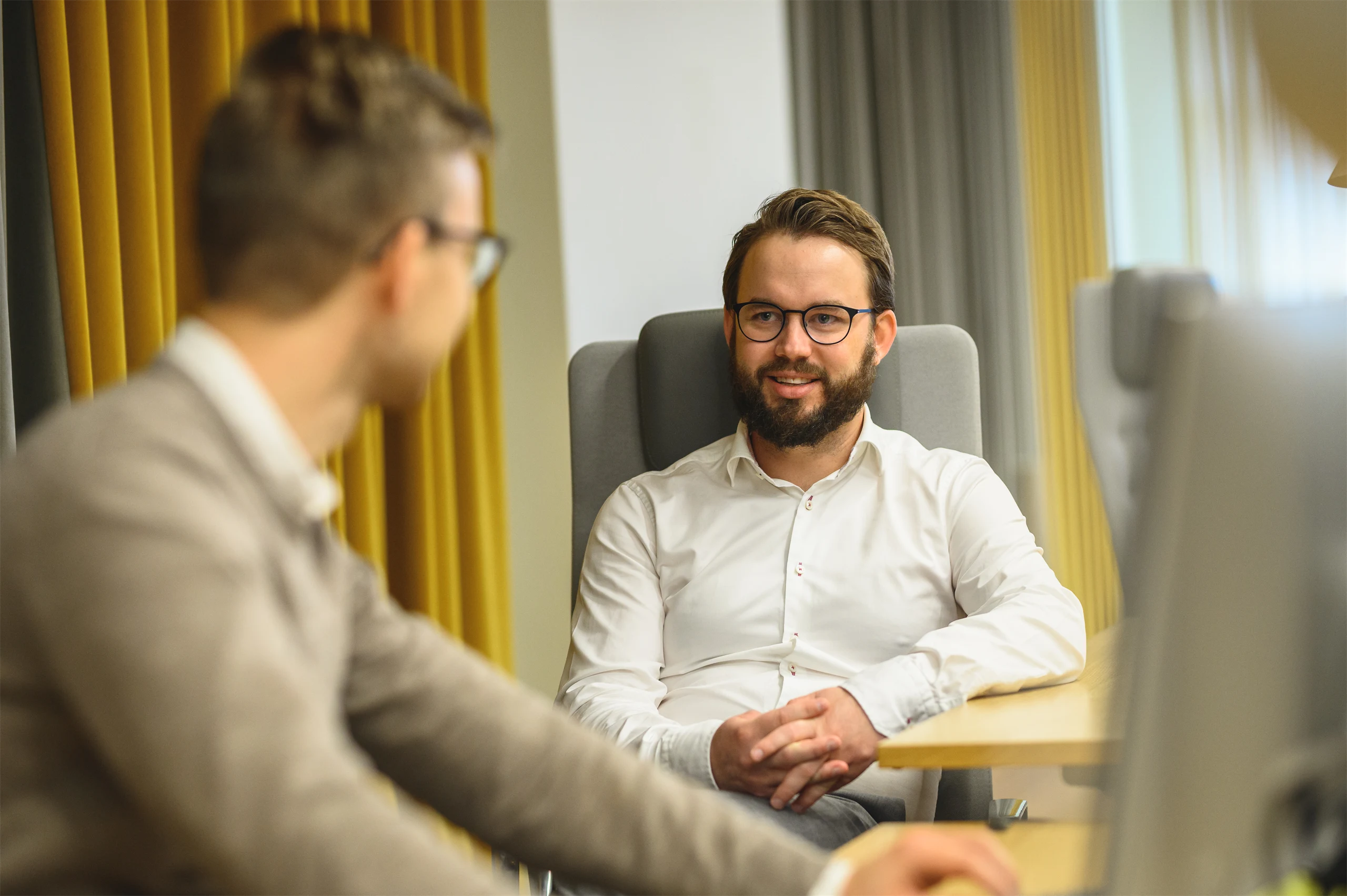 Picture of a group of people in a meeting room