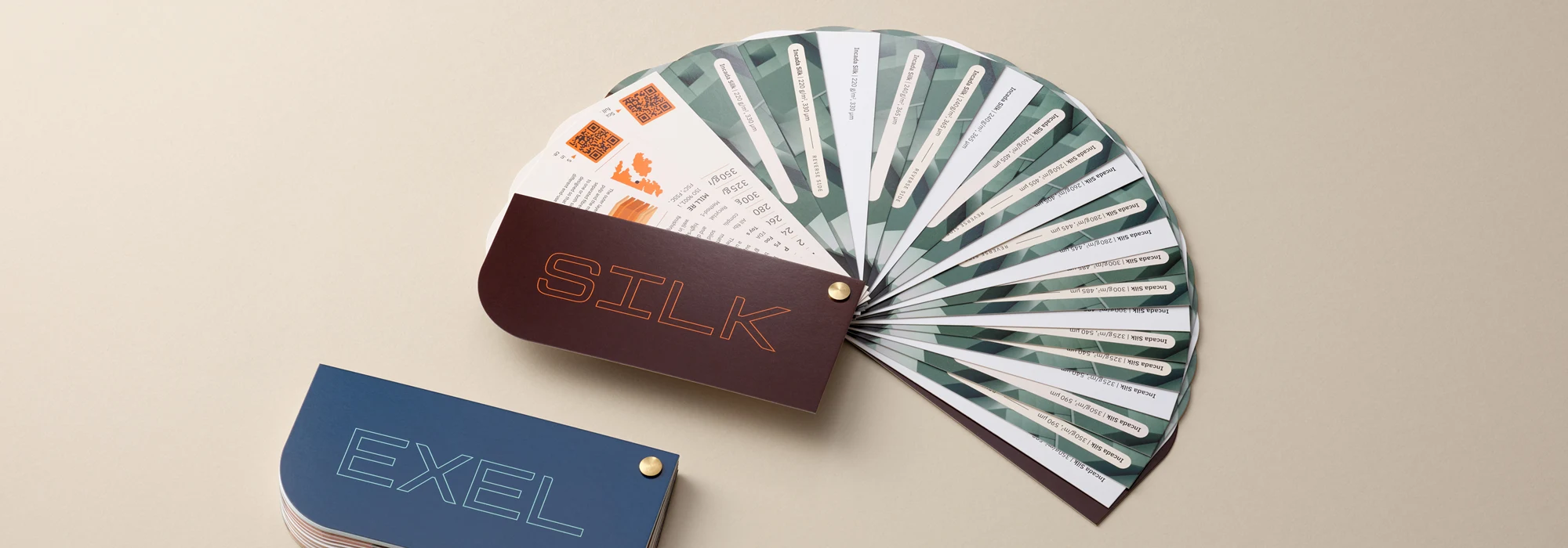 Paperboard fans placed on beige background