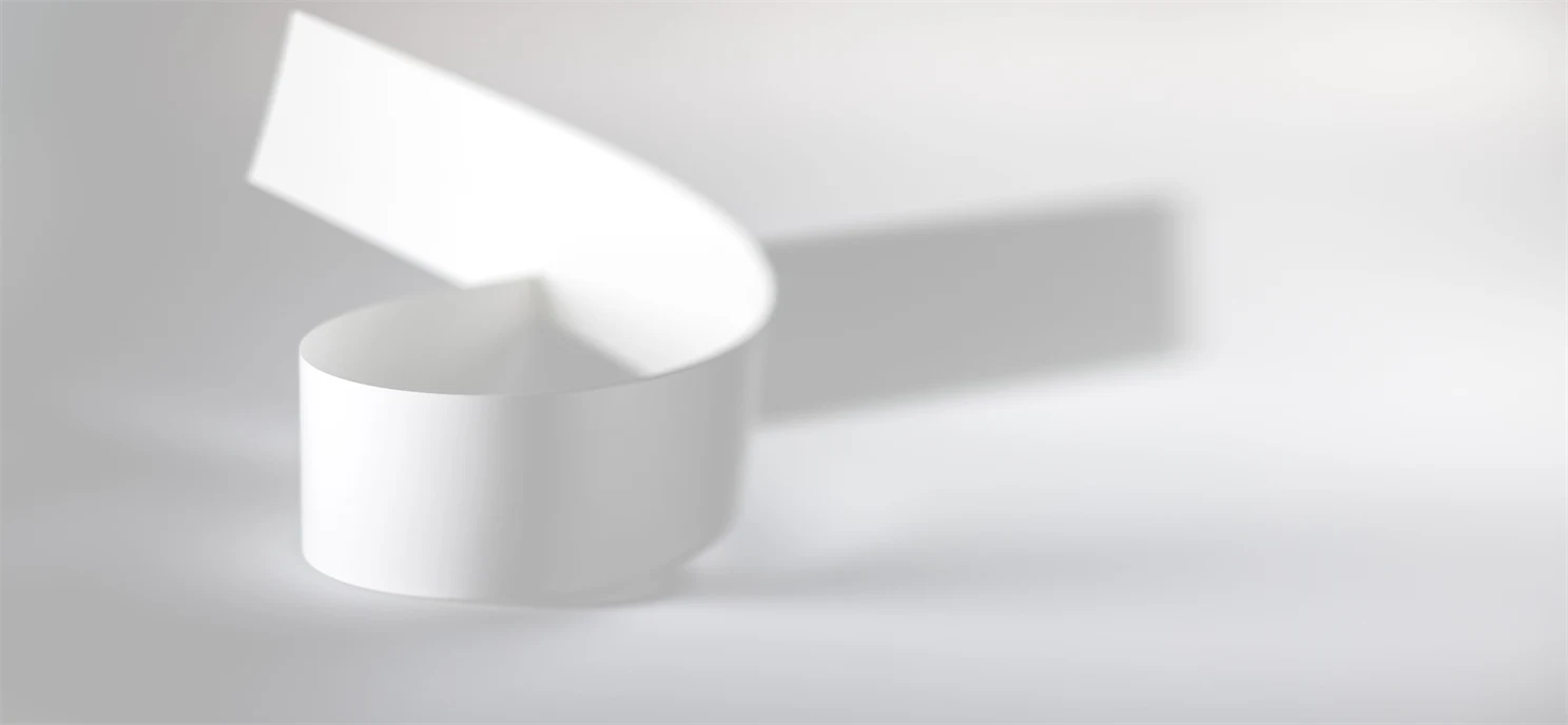 Paperboard strip arranged like a ribbon