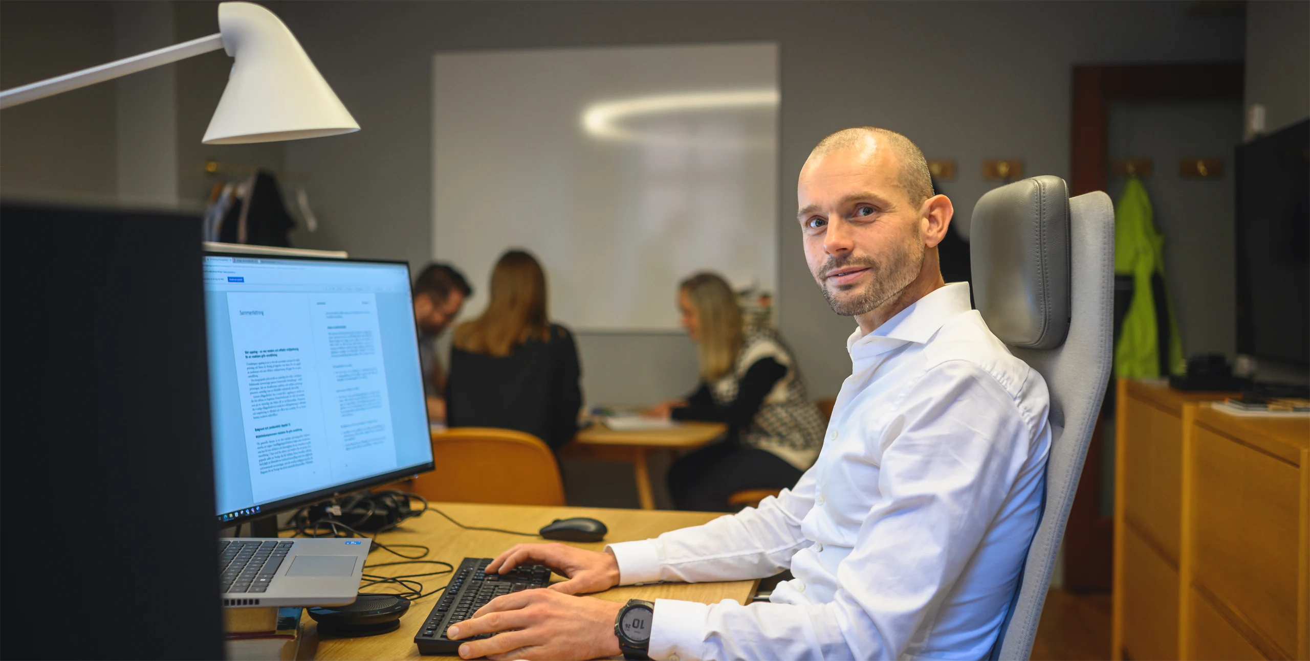 Picture of group of people in an office