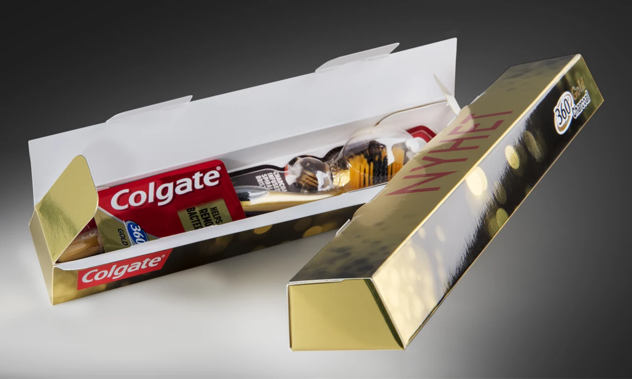 Golden Colgate toothbrush packaging
