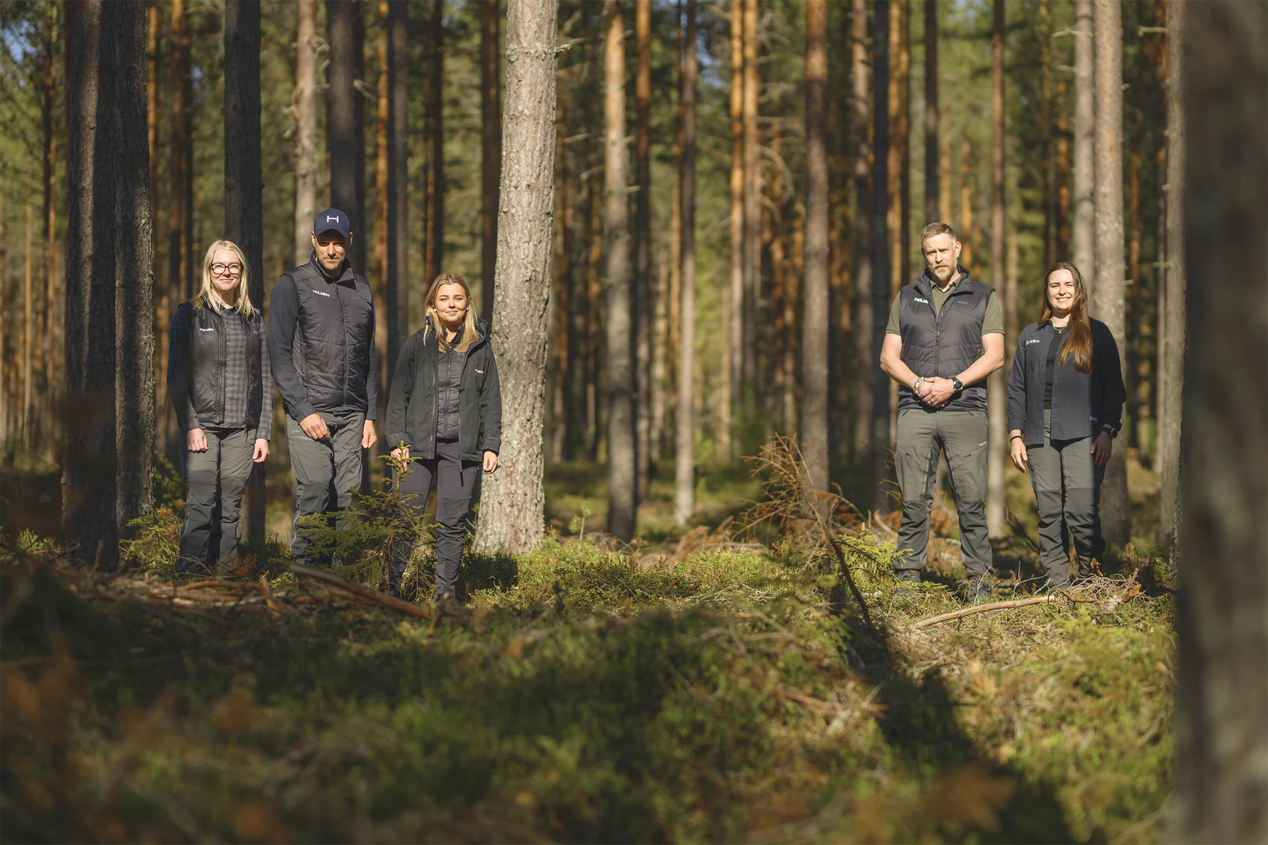 Female Holmen employee working in the forest