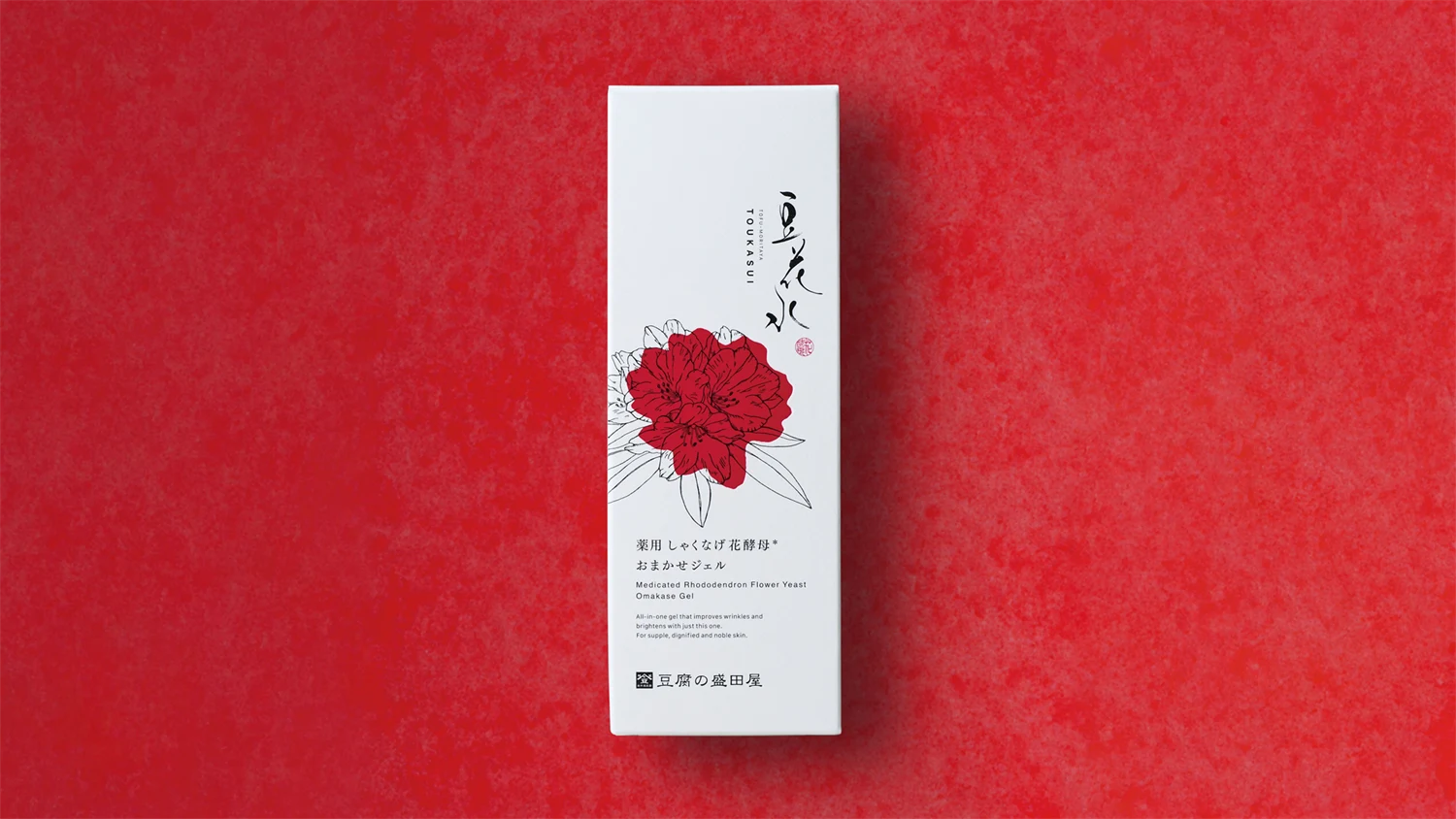 White packaging with a red rhododendron flower