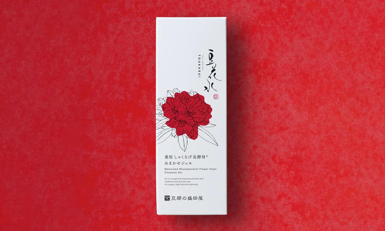 White packaging with a red rhododendron flower