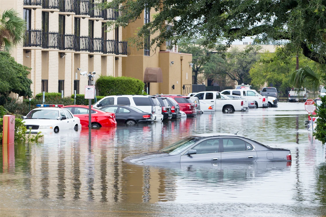 Flooded road with cars